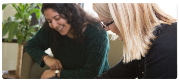 A faculty member works with a MSW student